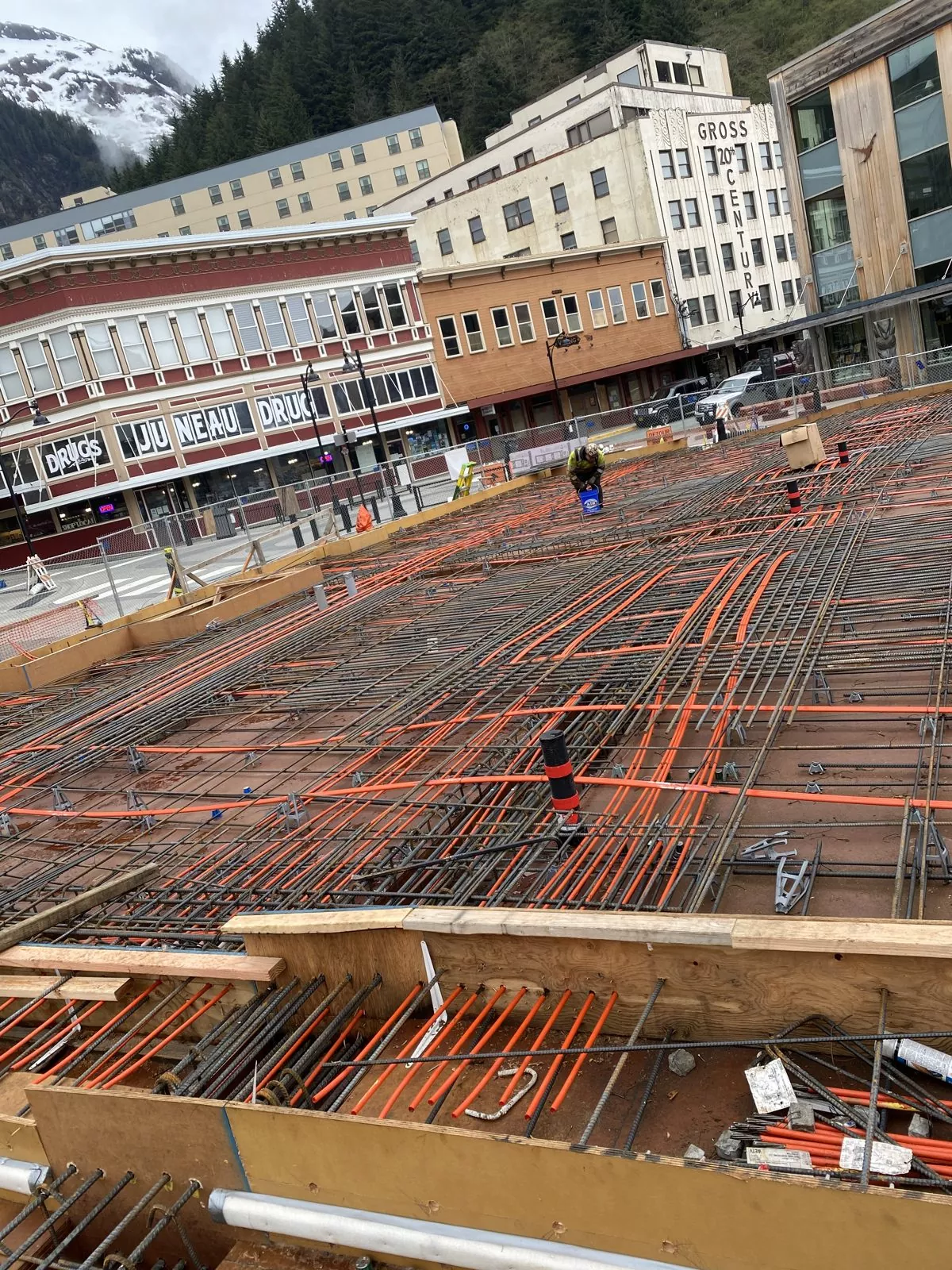 Ironworker tying mild steel between post-tension tendons